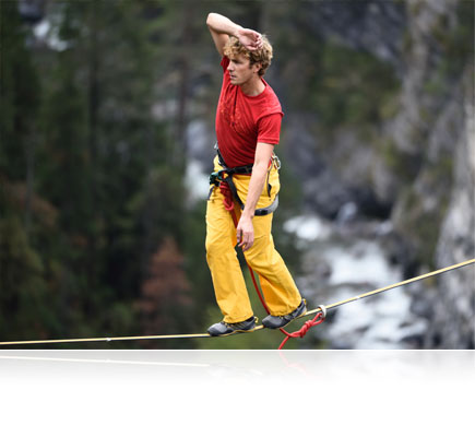 Photo of a tightrope walker over a gorge shot using the AF-S NIKKOR 300mm f/4E PF ED VR lens