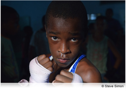 Photo of a young boxer facing the camera, taken with the AF-S NIKKOR 24-85mm f/3.5-4.5G ED VR lens.