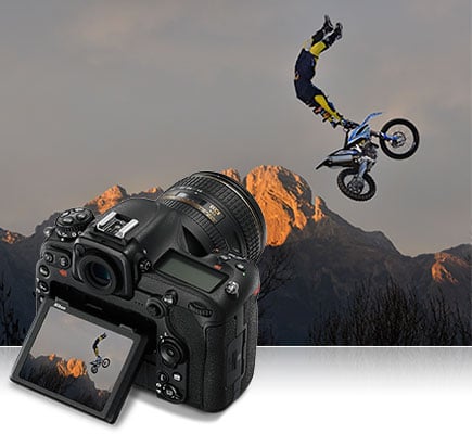 D500 photo of a motorcross rider in air with the D500 inset and the same photo on the camera's LCD