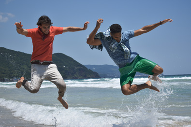 Fast 5 FPS shooting with the D3400 D3400 photo of two guys jumping over waves in the ocean