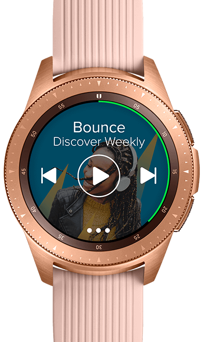 Closeup of a 42mm Rose Gold Galaxy Watch playing music with song info and play controls on the watchface.